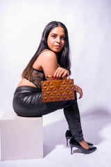 HAND CARVED TRIANGULAR PATTERN BAG WITH DOWEL HANDLE