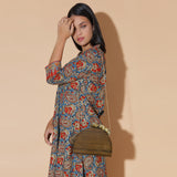 SEMI CIRCLE BAG WITH ORNATE BRASS FLOWERS IN SOLID SHEESHAM WOOD