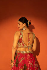 Red floral lehenga with mirror-work blouse and placement dupatta.