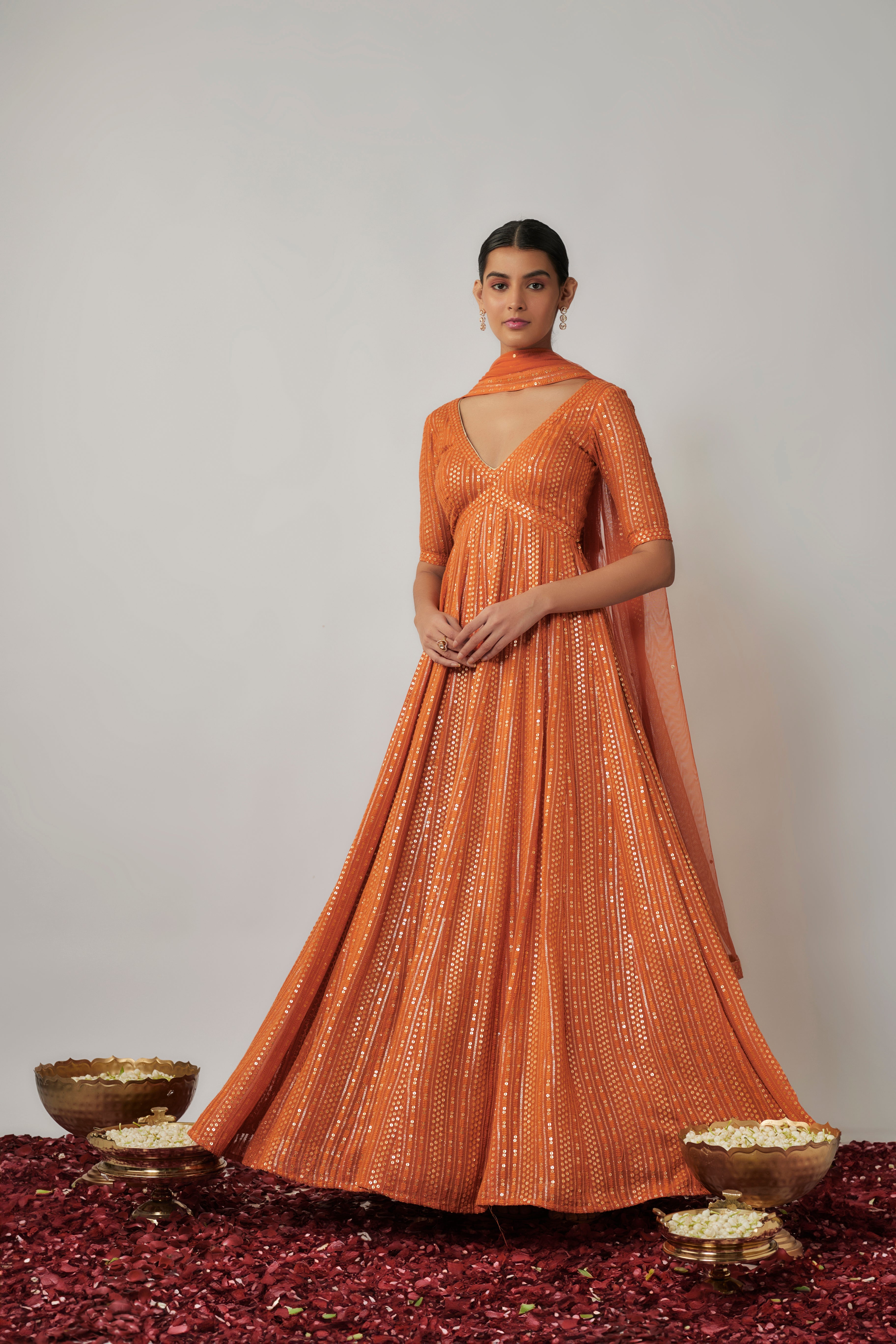 Saffron orange sequin and thread embroidered georgette anarkali gown set