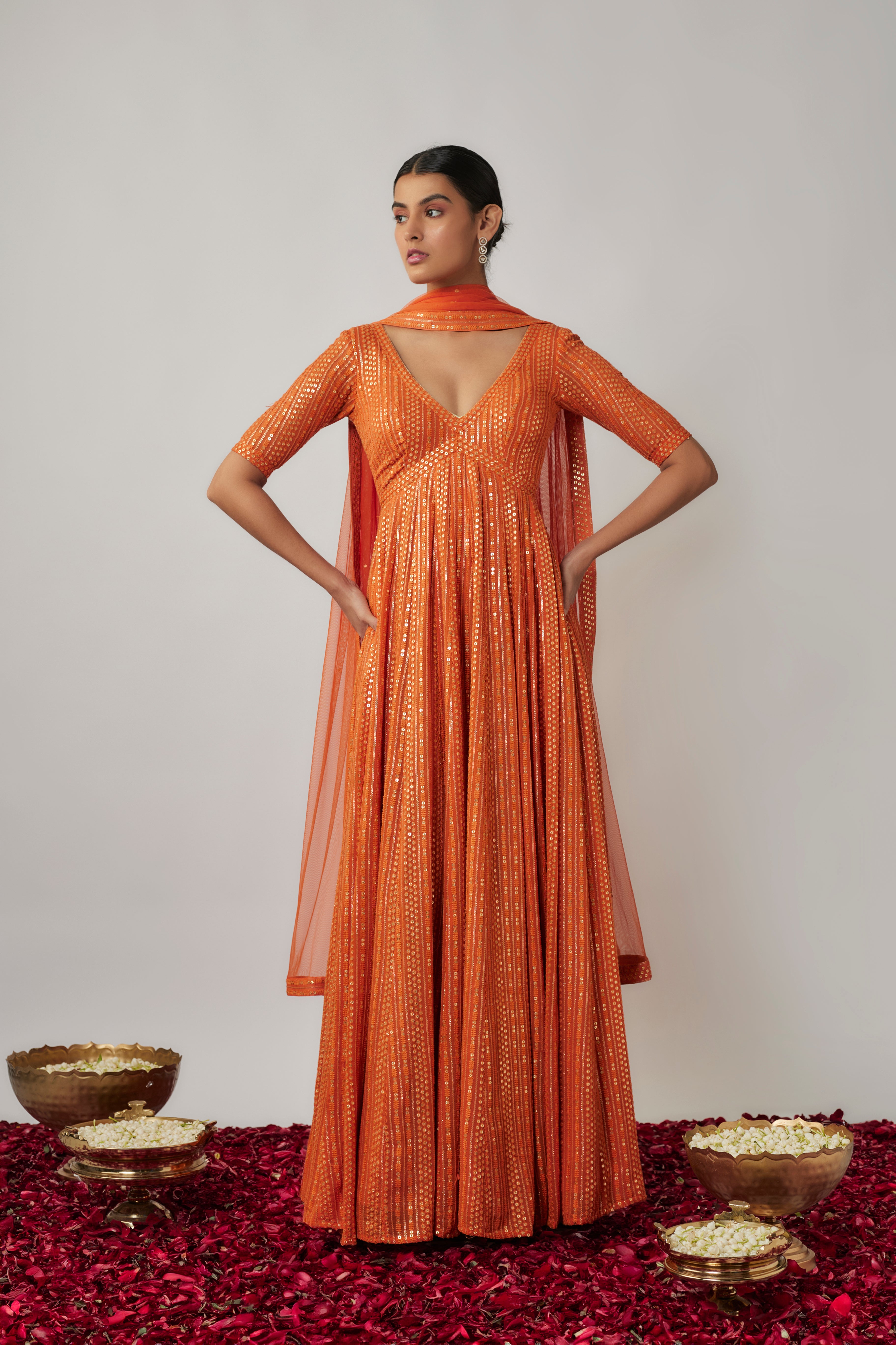 Saffron orange sequin and thread embroidered georgette anarkali gown set