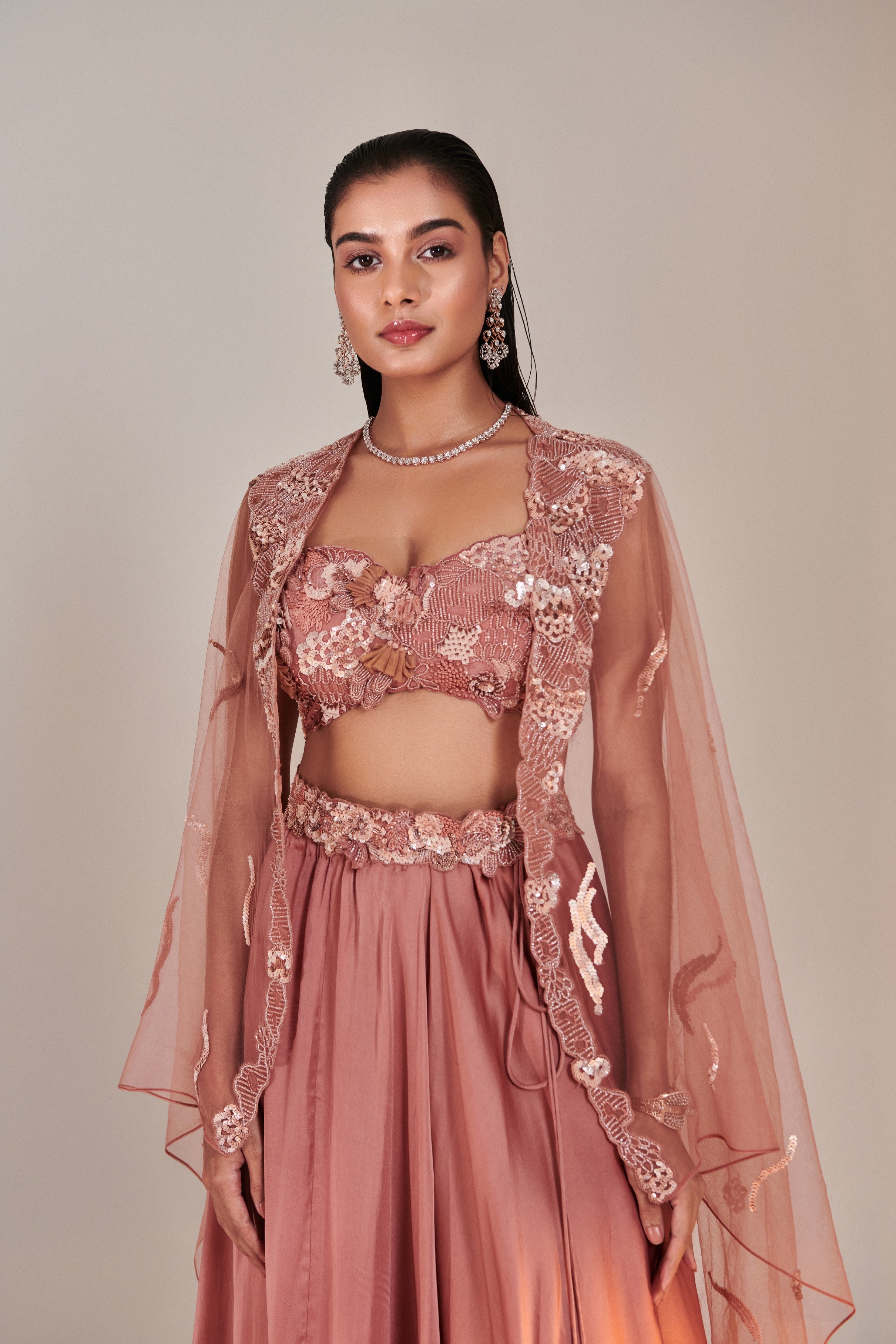 Salmon pink cutwork blouse applique lehenga