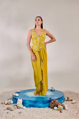 Sleeveless jacket and drape skirt