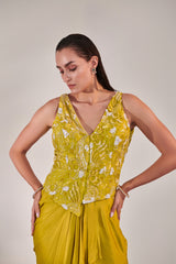 Sleeveless jacket and drape skirt