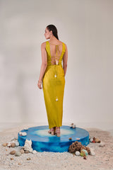 Sleeveless jacket and drape skirt