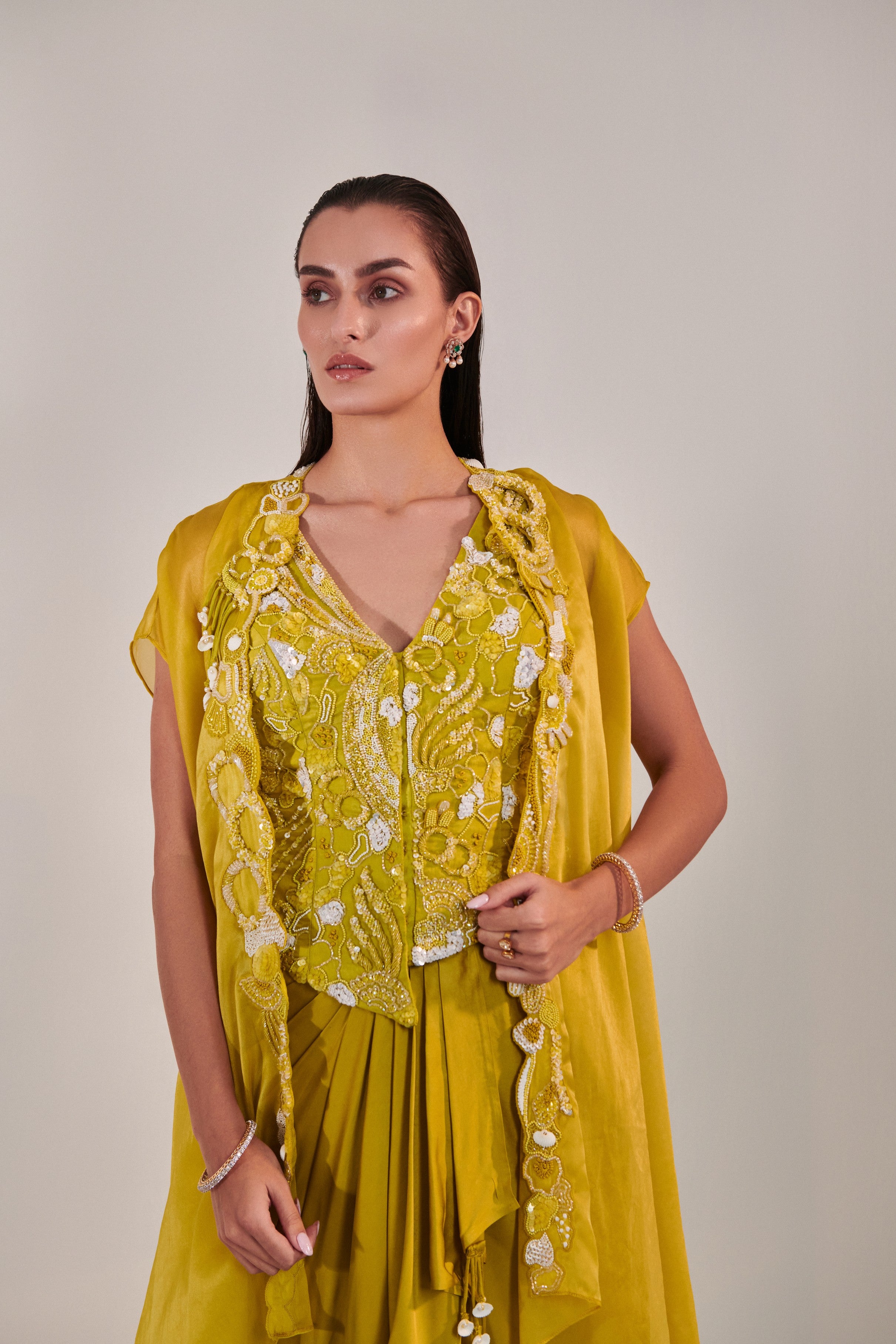 Satin organza cape and fitted sleeveless jacket and drape skirt set