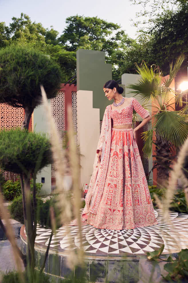 Coral velvet heavily embellished lehenga