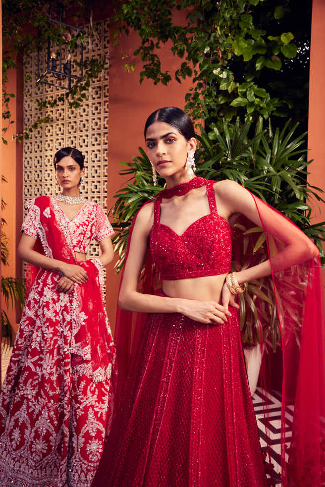 red heavily embellished lehenga